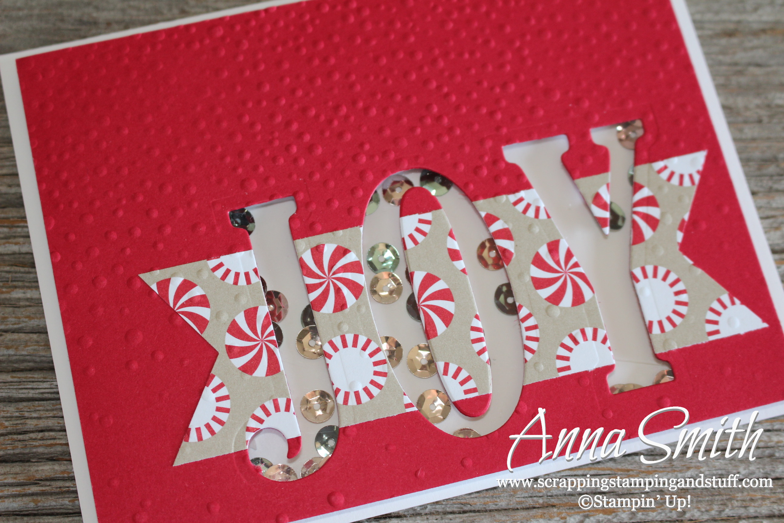 A joyous Christmas shaker card made with Stampin' Up! Large Letters framelits, Candy Cane Lane designer paper and Softly Falling embossing folder