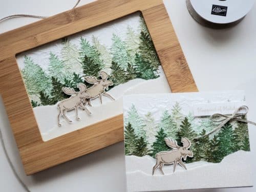 Winter moose scene card and framed art using the Stampin' Up! Merry Moose stamp set and moose punch! Includes tissue paper stamping technique tutorial.