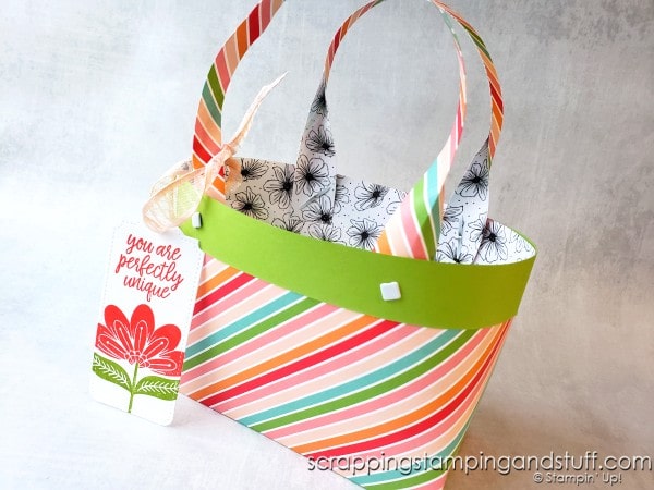 Make this paper tote bag to use as a cute gift bag for all your gift giving needs. Click here for the full tutorial!