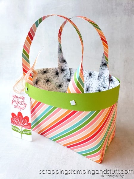 Make this paper tote bag to use as a cute gift bag for all your gift giving needs. Click here for the full tutorial!