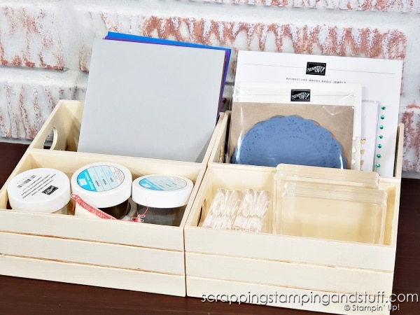 Click to see 12 ways to use a dollar tree crate for craft room organization! Organize your adhesives, embellishments, ink pads and more using a $1 wood crate!