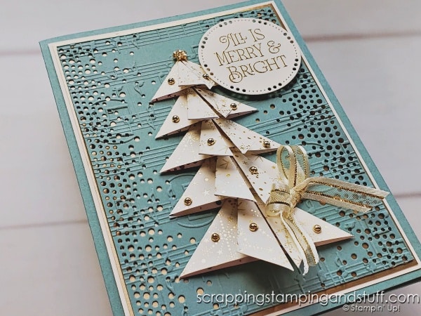 Click to see this stunning card featuring a paper folded Christmas tree you can create in minutes! Background features the Stampin Up Brightest Glow bundle.