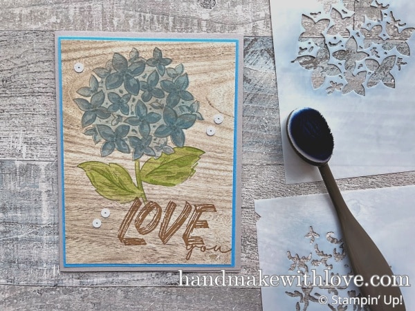 Click to learn how to make your own masks to make it quick and easy to add color to stamped images using a blending brush!