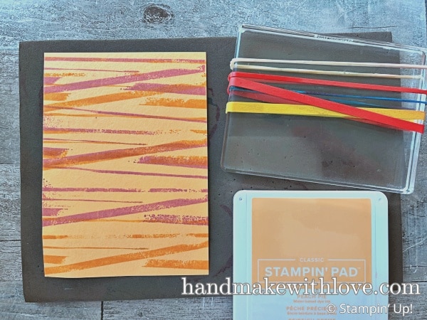 Click to see a rubber band trick for card making to make fun and unique backgrounds! Try this today!
