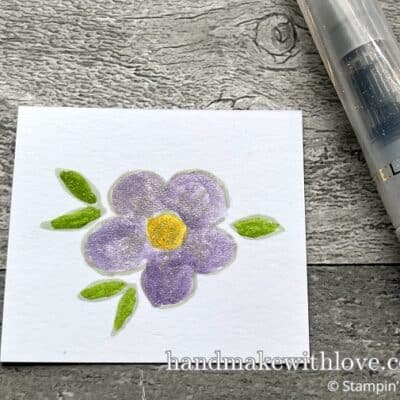 Learn how to use a Wink of Stella brush combined with ink for a truly stunning, no-mess glitter watercoloring effect!