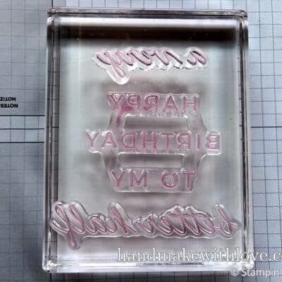 Learn how to line up stamps perfectly on an acrylic block and it's easier than you think! You have to see this to believe how easy the solution is!